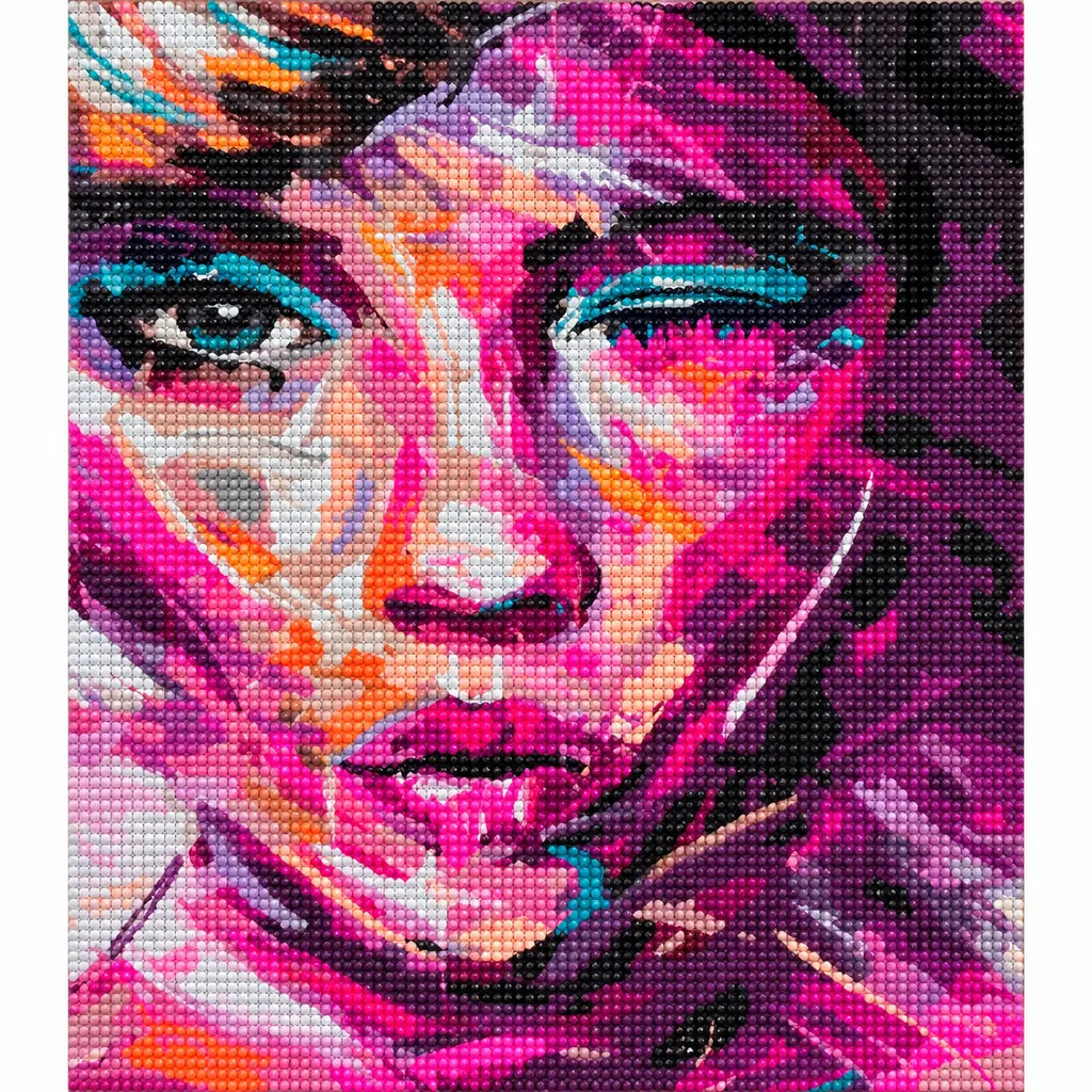 Finished diamond painting of an abstract woman portrait in vivid magenta and violet tones.