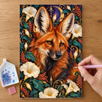 Hands placing drills on the Maned Wolf Moonflower Frame diamond painting canvas