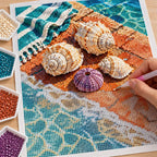 Hands placing diamond drills on the Sea Urchins and Shells design.