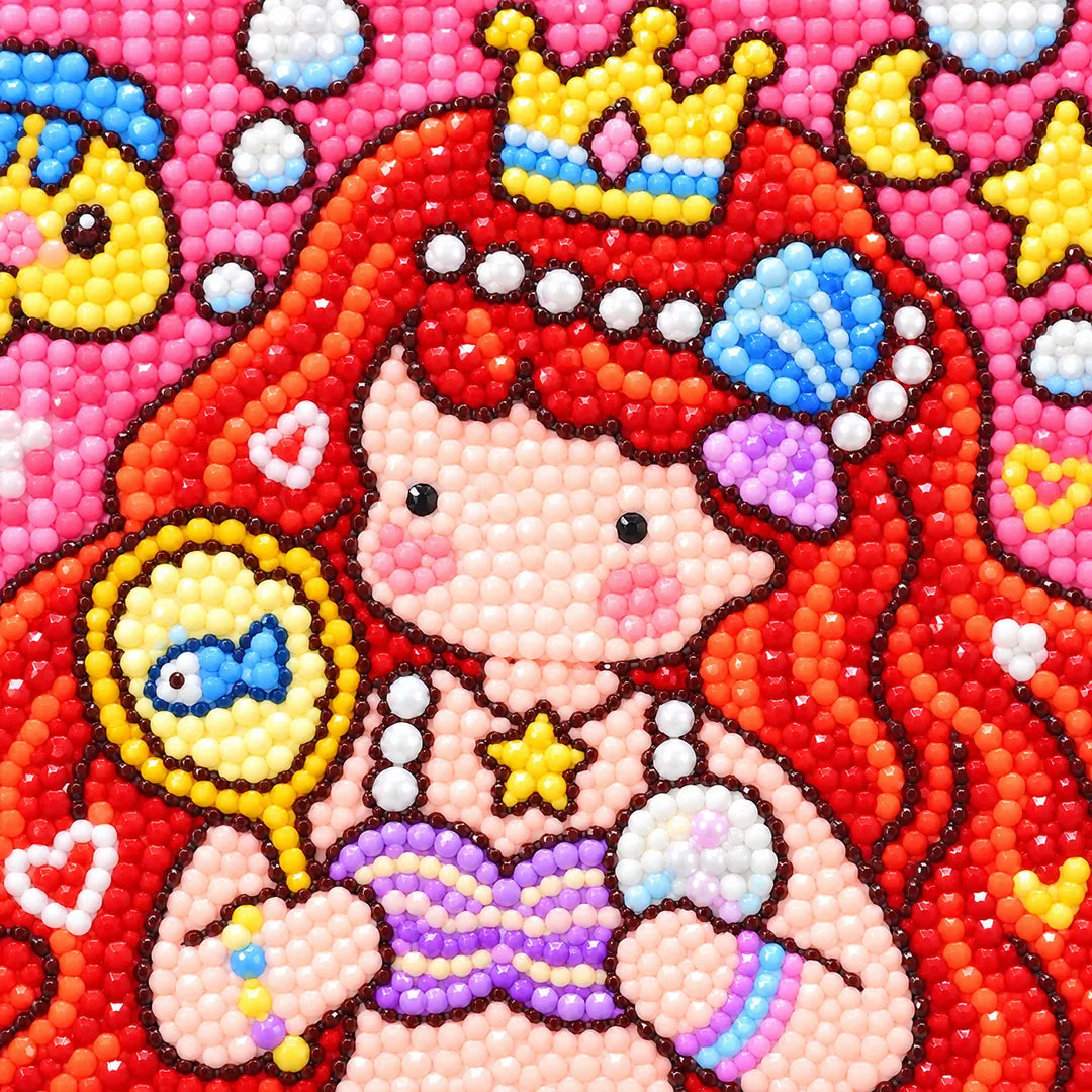 Close-up diamond drill detail of mermaid hair, seashells, and bright coral