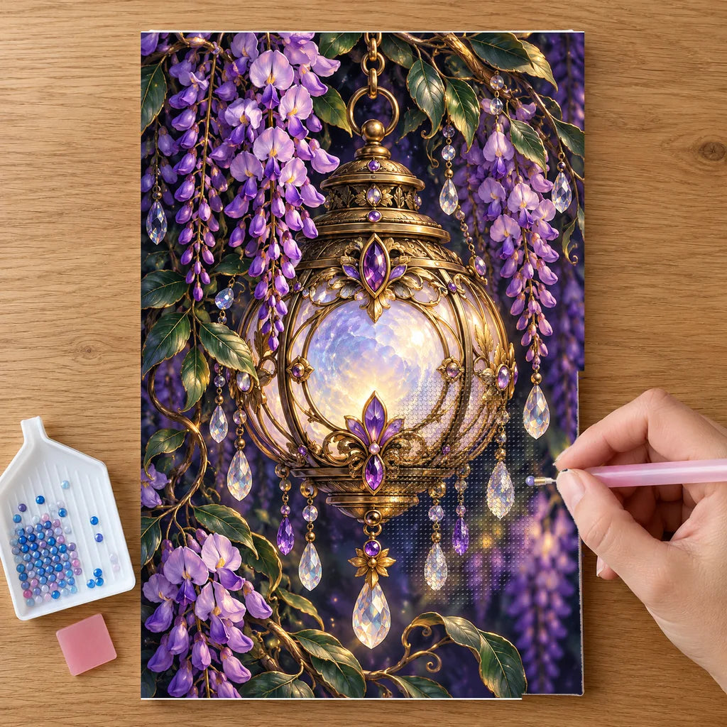 Hands placing drills on the Moon Lantern and Wisteria diamond painting canvas