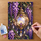 Hands placing drills on the Moon Lantern and Wisteria diamond painting canvas