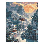 Finished diamond painting of a sanctuary among steep mountain peaks under a glowing moon.