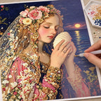 Diamond painting process for Moonlit Shell Maiden, with drills being placed over a floral-crowned woman holding a glowing seashell beneath a dark sky.