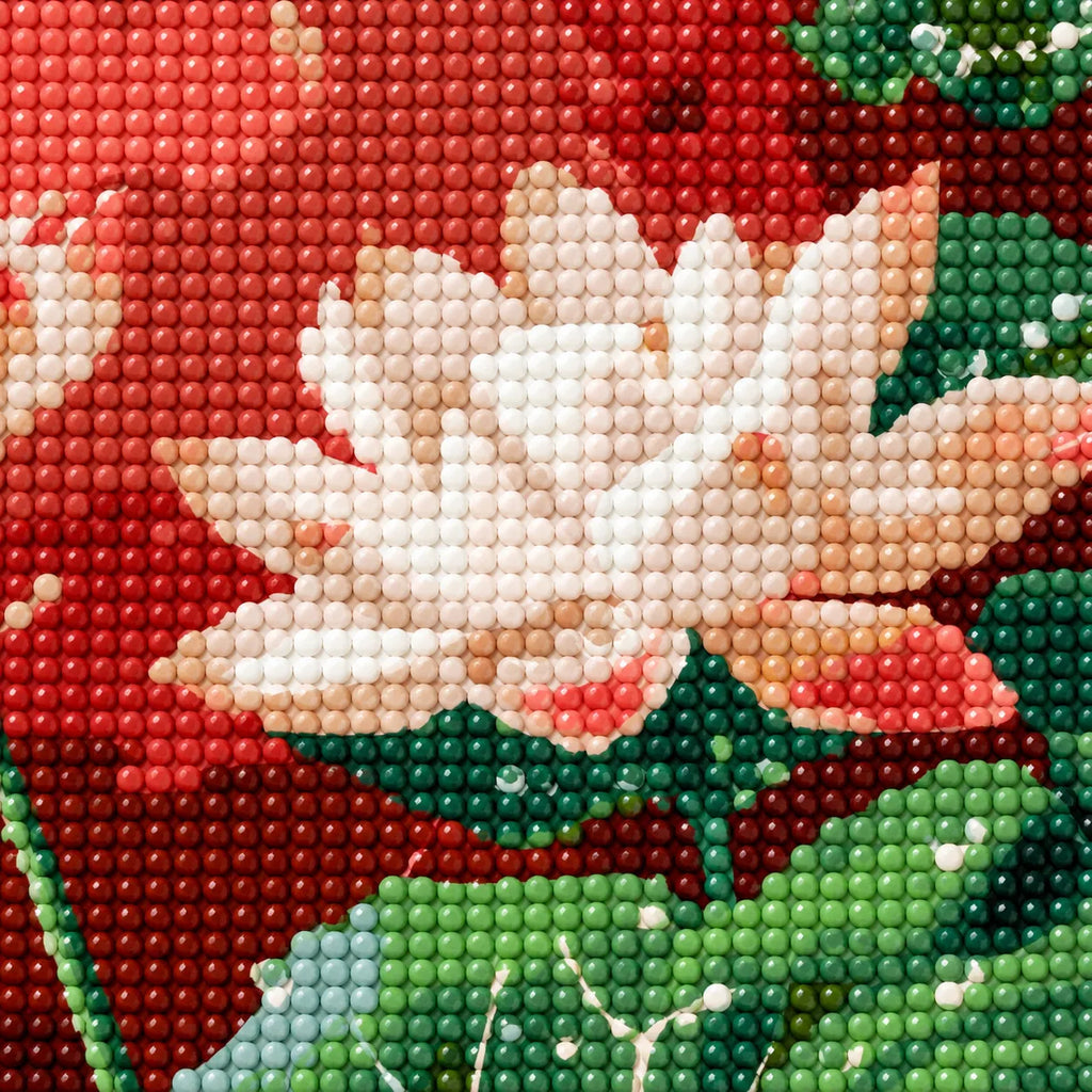 Close-up of diamond drills on artwork showing white lotus flowers and broad green leaves against a warm red backdrop.