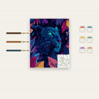 Complete Neon Blue Leopard Portrait numbered canvas being painted with acrylic paints and brushes
