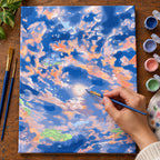 Complete Pastel Sunset Clouds numbered canvas being painted with acrylic paints and brushes