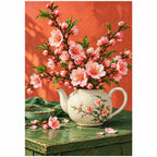 Pink peach blossoms growing from a teapot: finished diamond painting on a white background