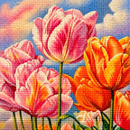 close-up of diamond drills on pink and orange tulips beneath pastel clouds — detail image, diamond painting kit