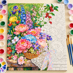 Pink Peony Flower Basket Garden Paint by Numbers Kit: complete numbered canvas with paints and brushes arranged for painting