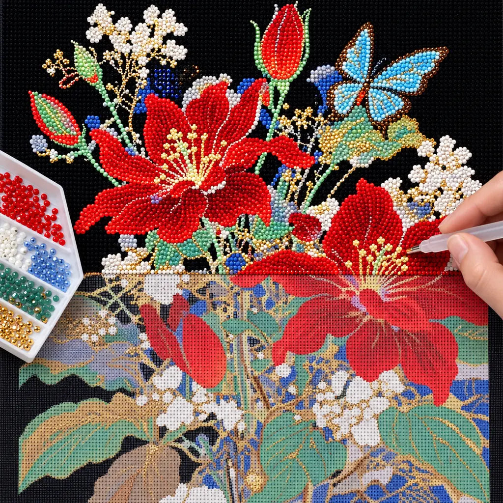 Diamond painting process for red hibiscus blooms, pale blossoms, and blue butterflies.
