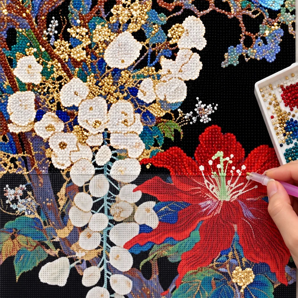 Diamond painting process for Red Hibiscus White Blossoms Diamond Painting Kit, with drills being placed over red hibiscus and white blossoms with pale accents on a dark background.