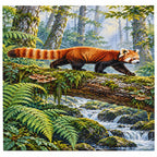 Completed diamond painting of a red panda on a mossy log on a white background