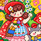 Close-up diamond drill detail of a red riding hood girl, white rabbit, and bright flowers
