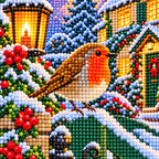 Close-up diamond drill detail of the robin and snowy winter scene