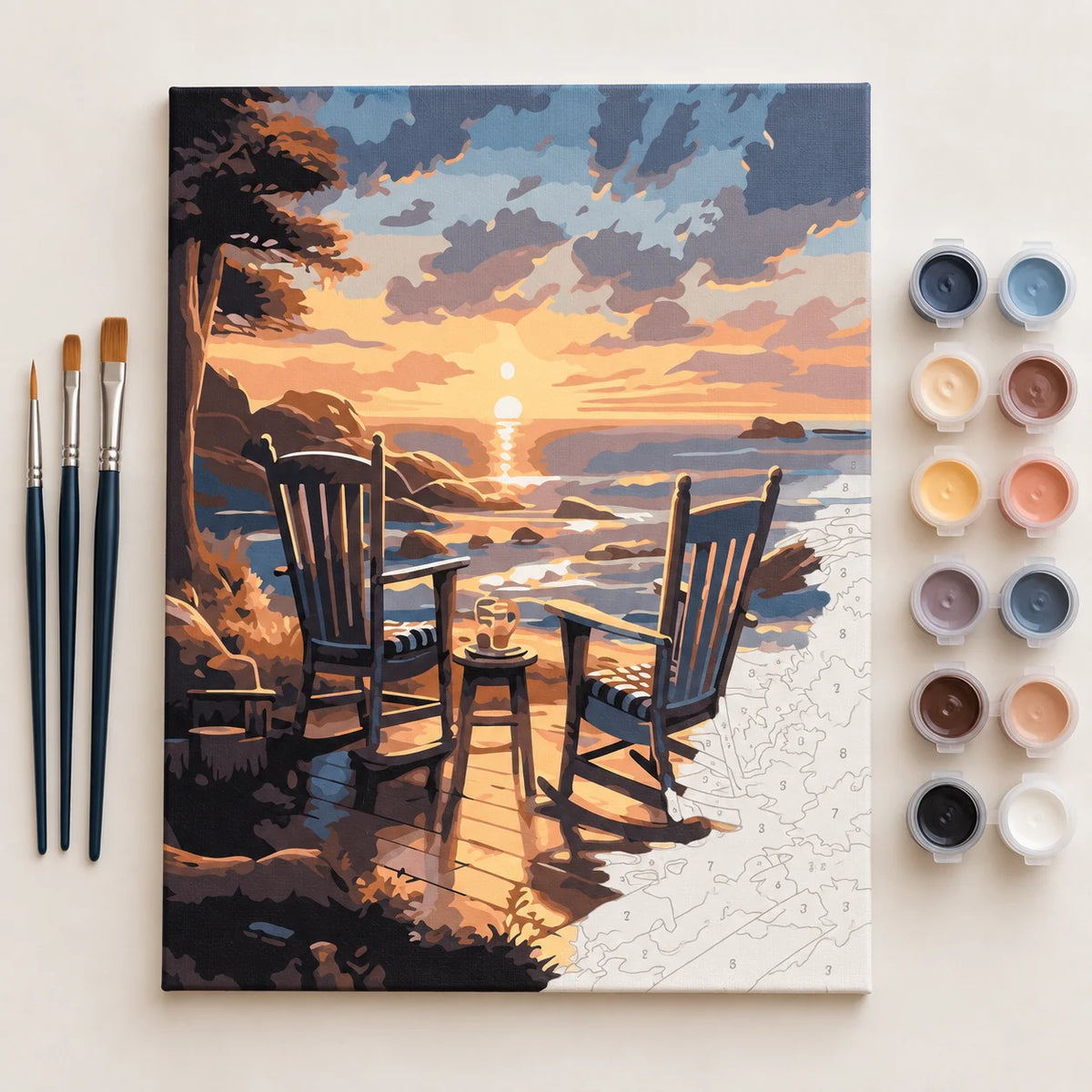 Complete Rocking Chairs at Sunset Beach numbered canvas being painted with acrylic paints and brushes