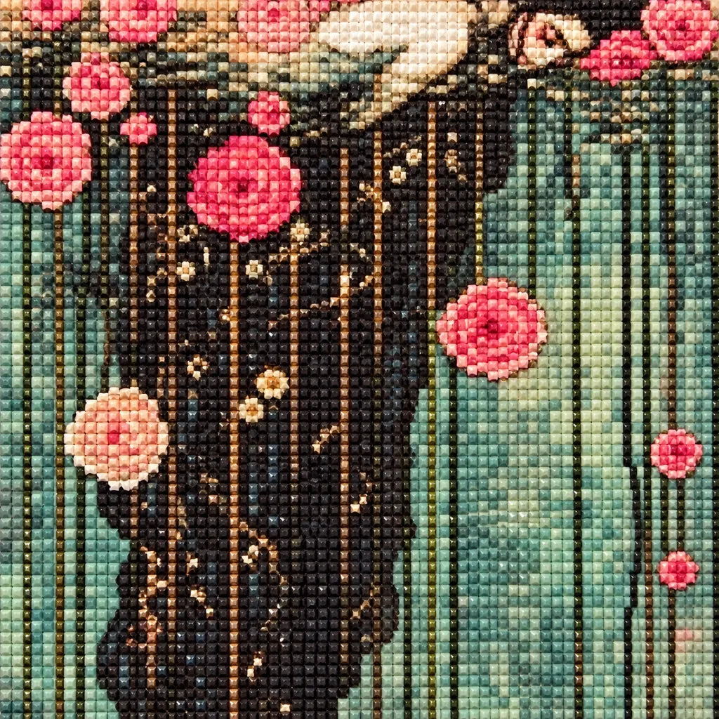 Close-up of diamond drills on artwork of a woman in a flowing rose-draped gown among water lilies.