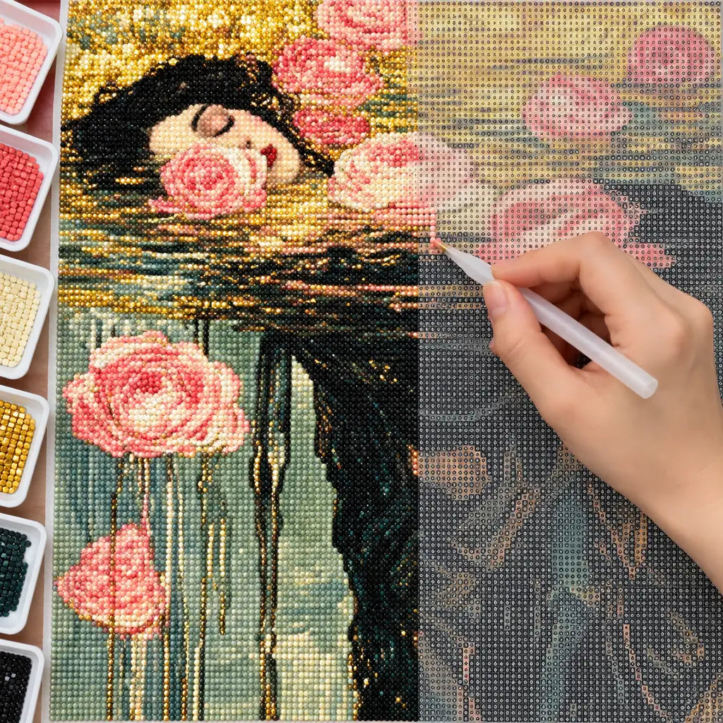Hands applying drills to a canvas with a woman's face resting among floating roses in dark water.