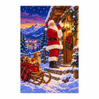 Finished diamond painting of Santa at an alpine chalet with a glowing lantern