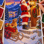 Hand placing diamond drills on the Santa alpine lantern canvas