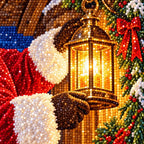 Close-up of diamond drills forming Santa's suit, lantern, and festive details