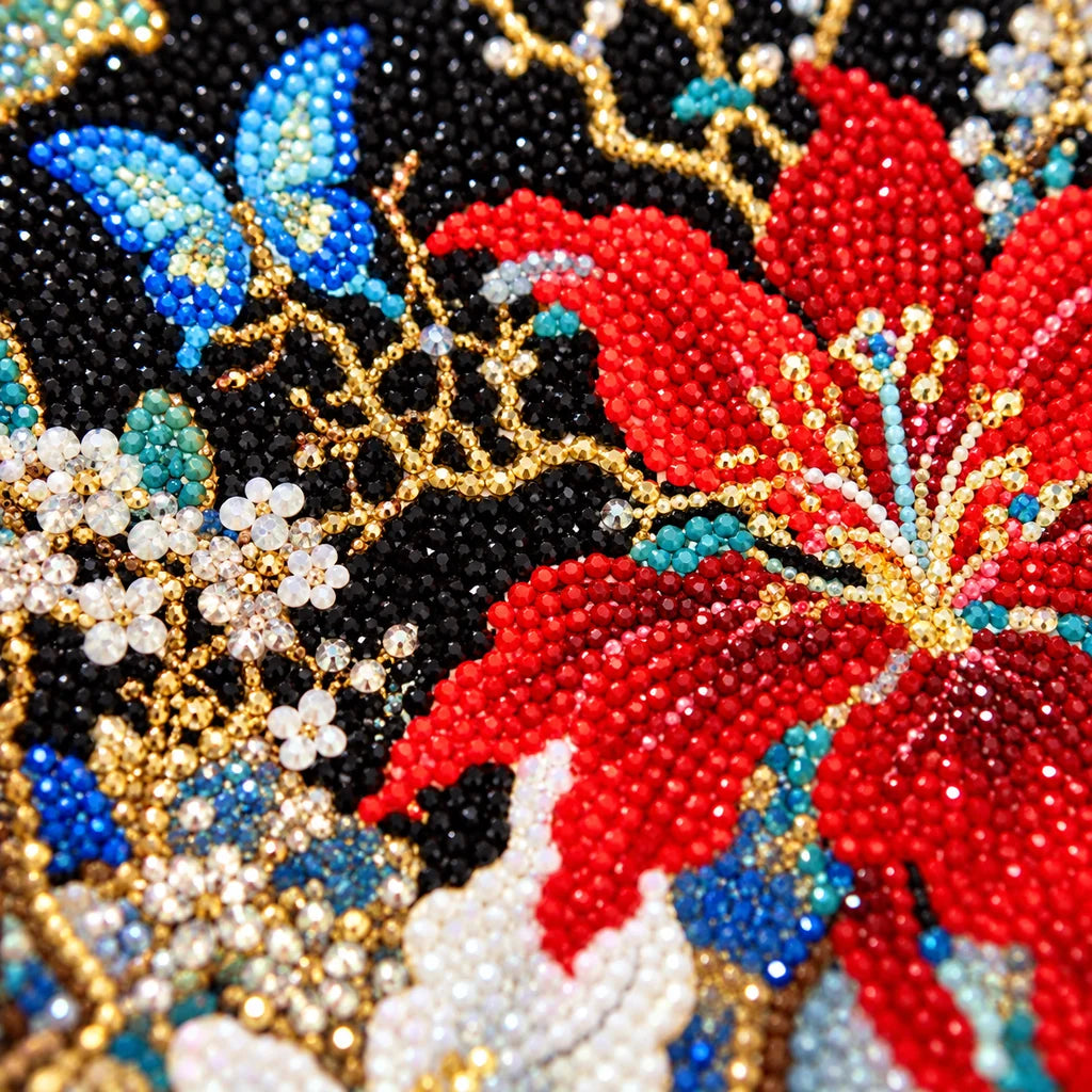 Close-up of diamond drill details in scarlet hibiscus, ivory lilies, and blue butterflies.