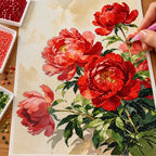 Diamond painting process for Scarlet Peony Bouquet Diamond Painting Kit, with drills being placed over a bouquet of scarlet-red peonies and pale blossoms.