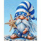 Finished diamond painting for Seaside Starfish Gnome Diamond Painting Kit, showing a seaside gnome in a starry blue hat holding a starfish.