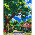 Completed Shade Of The Old Oak diamond painting showing a broad old oak shading a cottage lane under a blue sky.