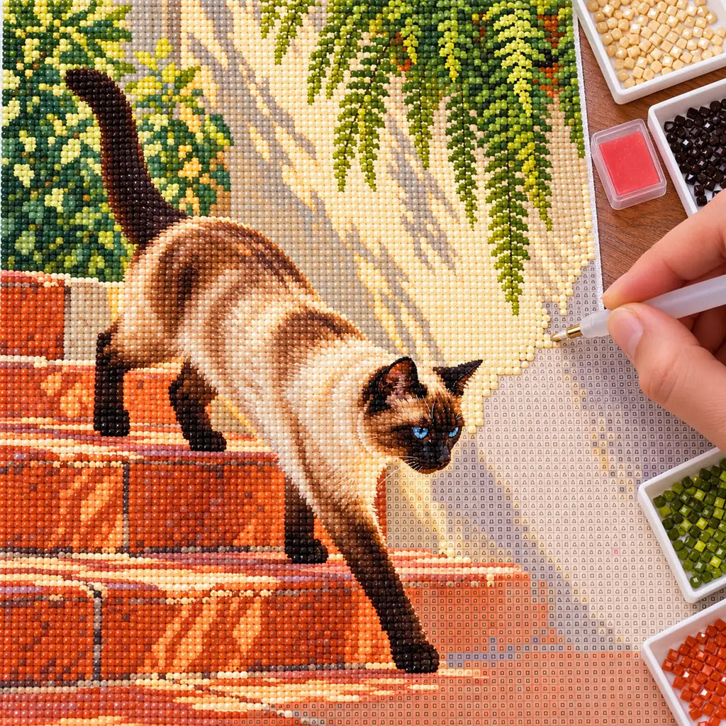 Hands placing drills on the Siamese Terracotta Steps diamond painting canvas