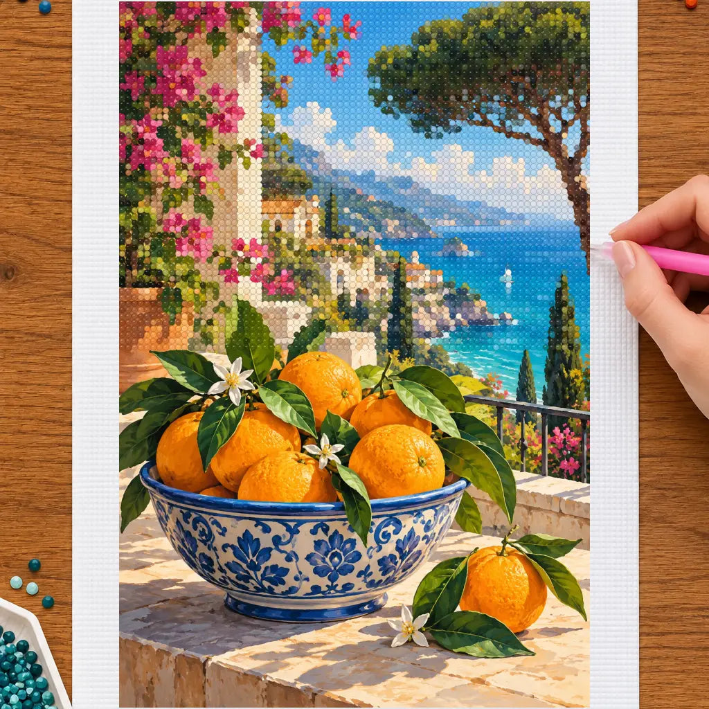 Hands placing drills on the sicilian ceramic oranges diamond painting canvas