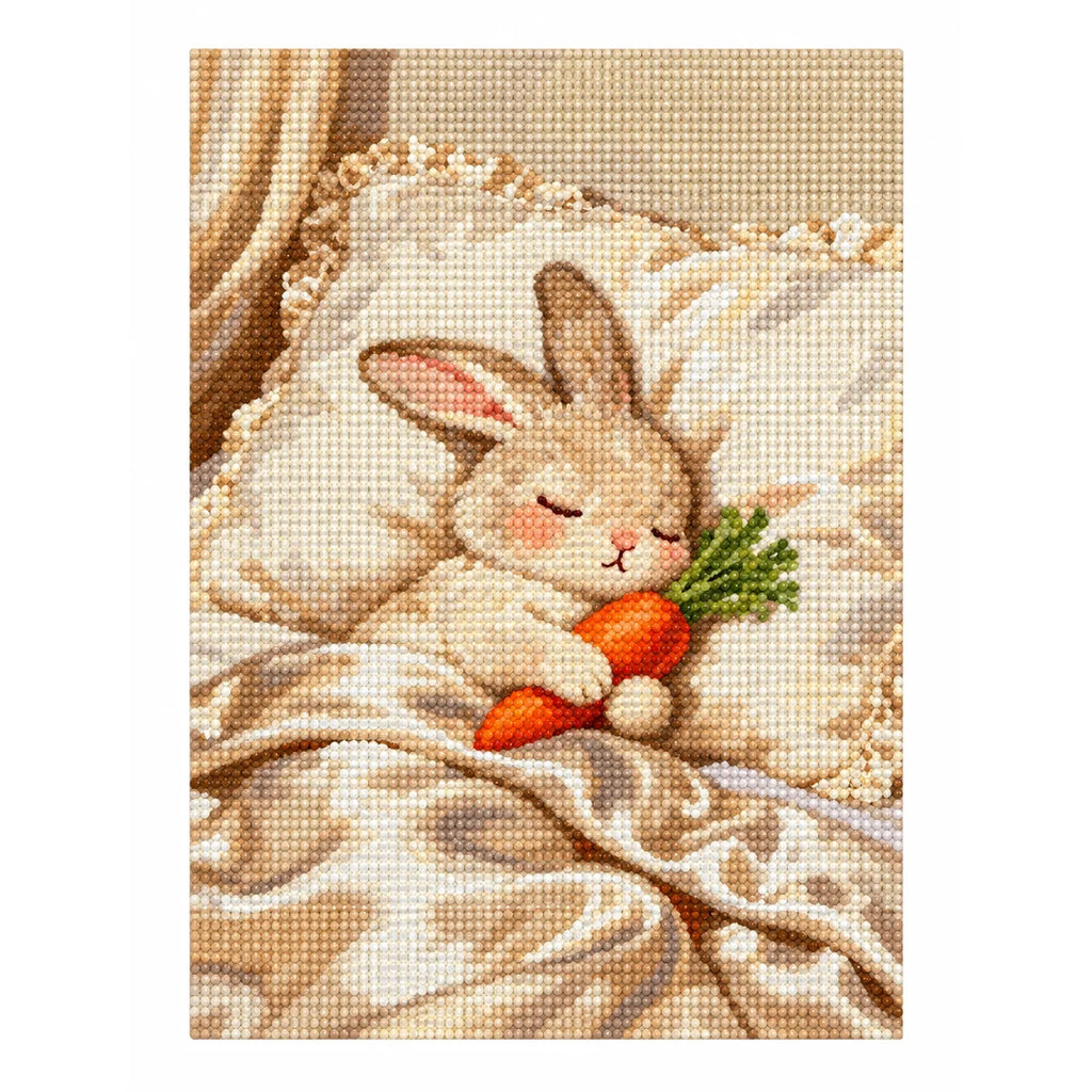 White-background diamondized artwork of a sleeping white bunny cuddling a carrot in bed
