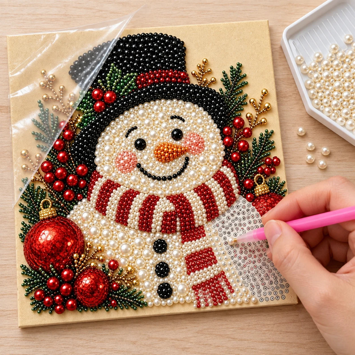 Illustrated process of placing pearls on the Smiling Snowman printed canvas