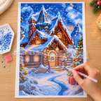 Diamond painting process for snowfall over christmas village.