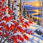 Close-up of sparkling drills forming crimson leaves and snowy birch trunks.