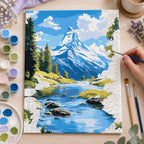 Complete Snowy Mountain River numbered canvas being painted with acrylic paints and brushes