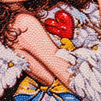 Close-up diamond drill detail of the girl, red heart, and white wings