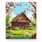 Spring Cabin under Cherry Blossoms paint by numbers artwork on a front-facing canvas against a white background