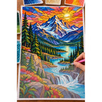 Hands placing drills on the stained glass mountain river canvas.