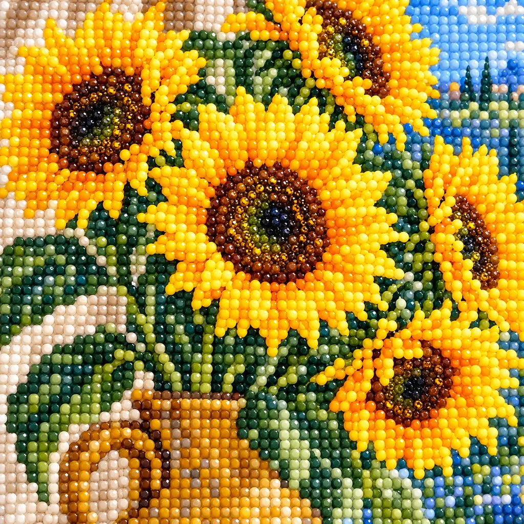 Golden sunflowers in an ochre vase beside a blue window: close-up of diamond drills