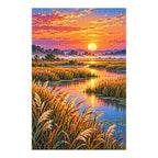 Finished diamond painting of sunrise over a quiet wetland with golden reeds and still water on a white background.