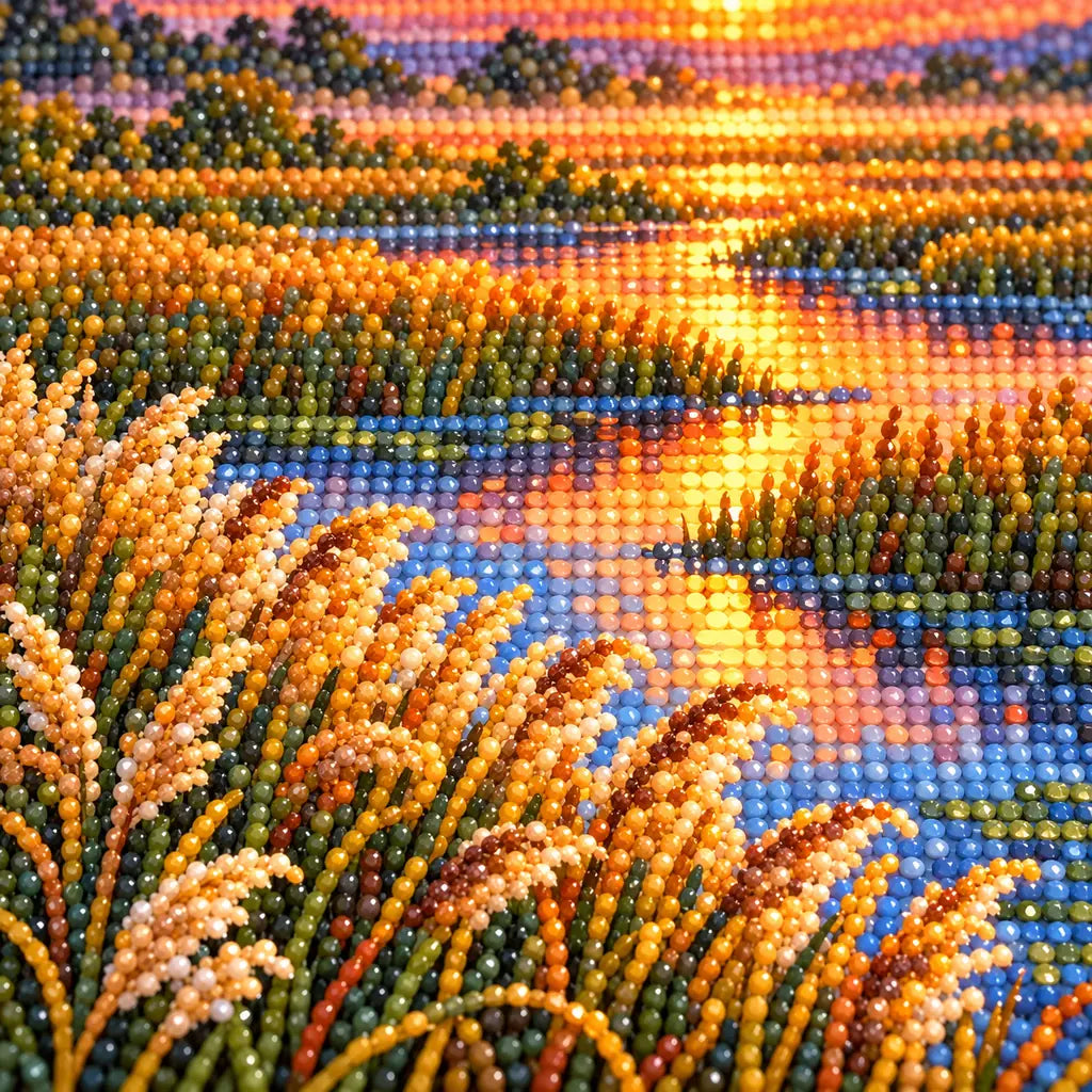 Close-up of faceted drills showing glowing sunrise reflections between marsh reeds.