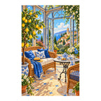 Finished white-background diamond painting of lemons, tea, and wicker chairs in a sunroom