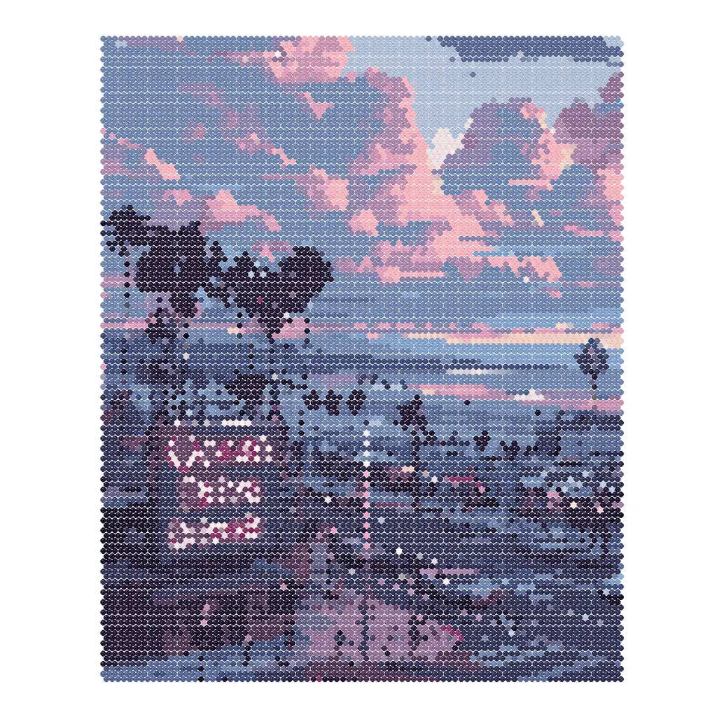 Finished diamond painting for Sunset Over Ocean Drive Diamond Painting Kit, showing a palm-lined coastal street beneath pink and lavender sunset clouds.