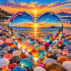 Close-up detail of drill texture across a heart-shaped opening among colorful beach stones framing a glowing sunset.