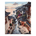 Original artwork for Sunset Village by the Stream Diamond Painting Kit, showing traditional riverside village homes reflected along a stream beneath sunset clouds.