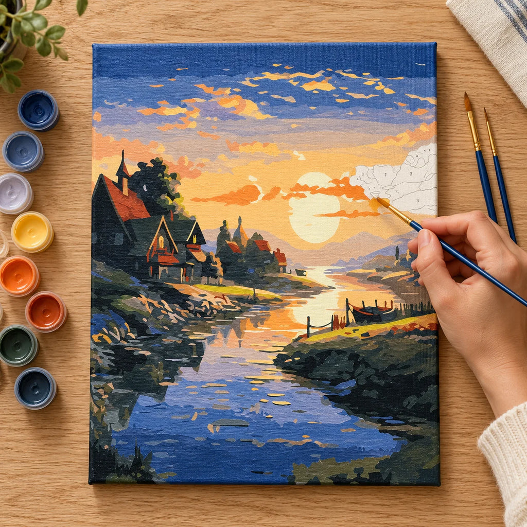 Complete Sunset Village by the River numbered canvas being painted with acrylic paints and brushes
