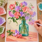 Pastel pink, coral, and lavender sweet peas in a green glass bottle: diamond painting in progress with a pen