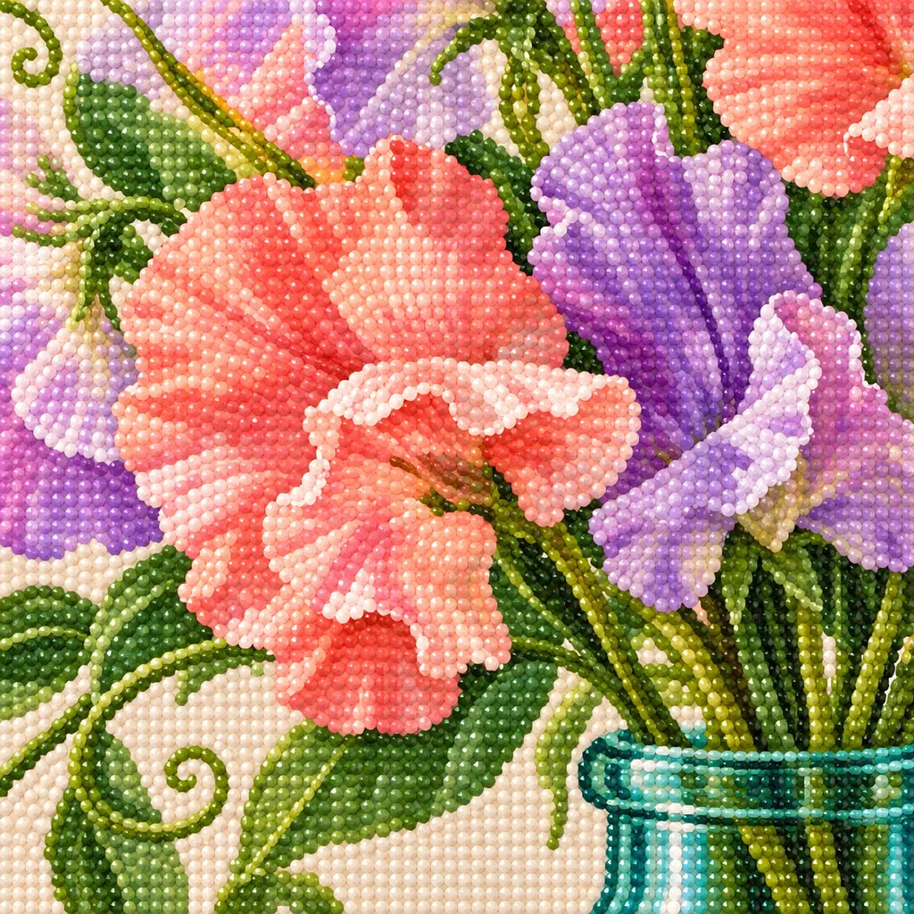 Pastel pink, coral, and lavender sweet peas in a green glass bottle: close-up of the diamond drills