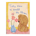 White-background original artwork of a seated brown bear beside a striped vase of flowers with the words Take time to smell the flowers for a diamond painting kit